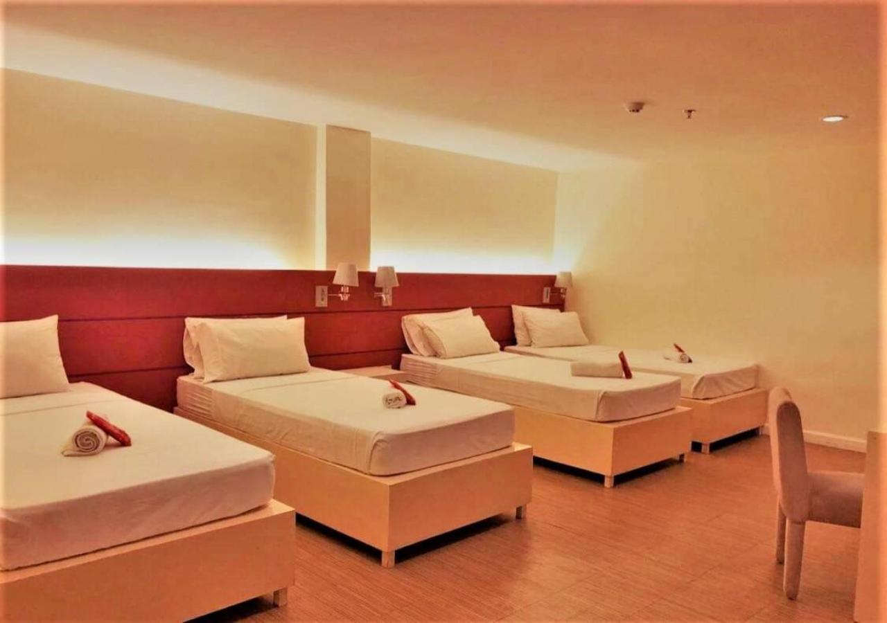 Reddoorz Plus At Hotel Metro Калибо Стая снимка
