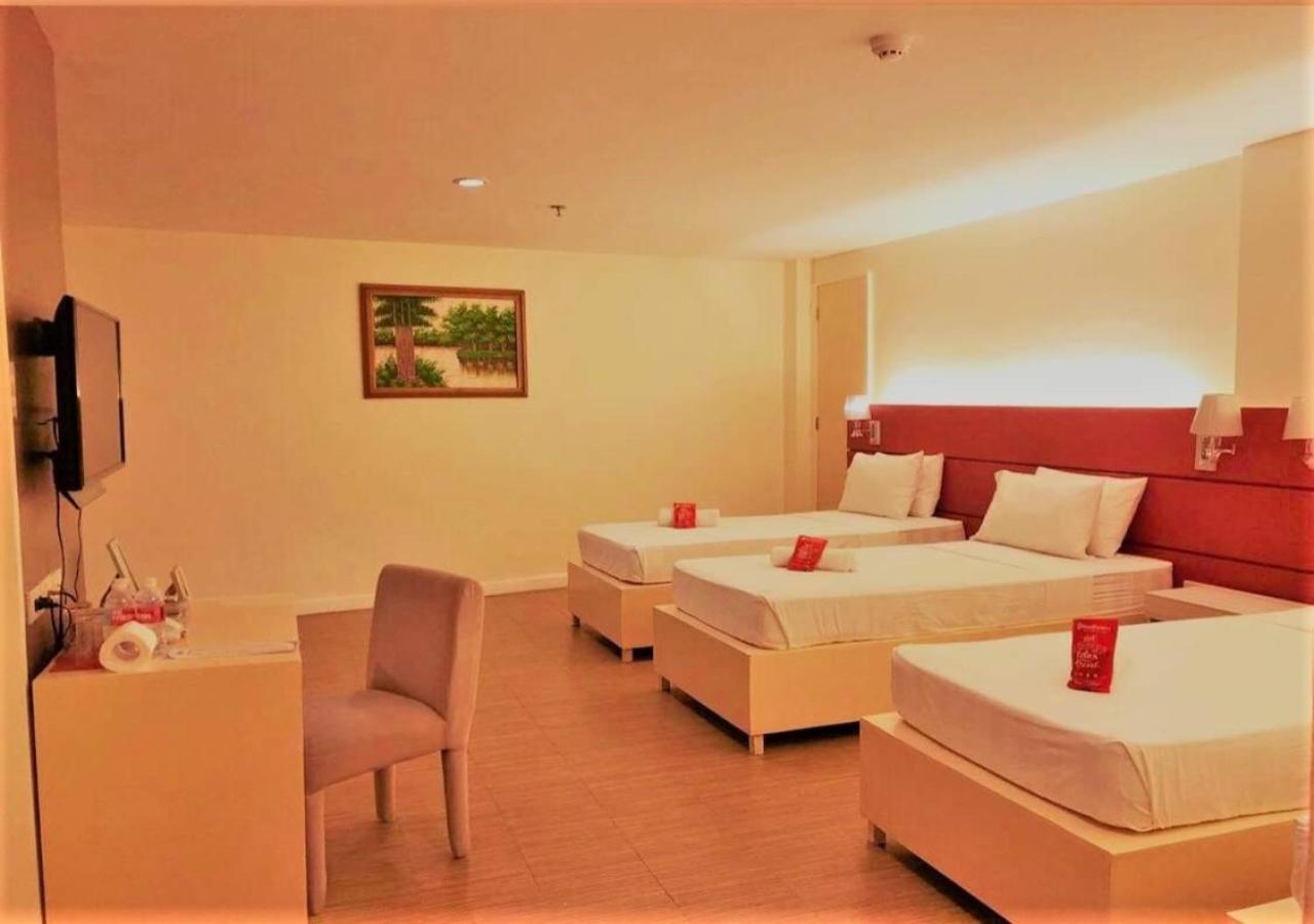 Reddoorz Plus At Hotel Metro Калибо Стая снимка